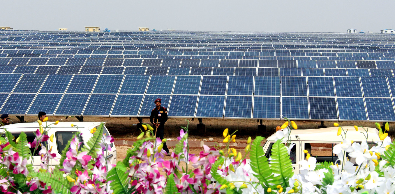 epa04101029 A general view of the Solar energy plant during the inauguration ceremony of solar energy plant in Bhagwanpur, Diken district Neemuch, Madhya Pradesh, 26 February 2014. The solar energy plant, covering some 4 million square meters of land, costing about 100 million euros and expected to deliver some 151 Megawatt of power, is said to be one of the biggest in Asia. EPA/SANJEEV GUPTA